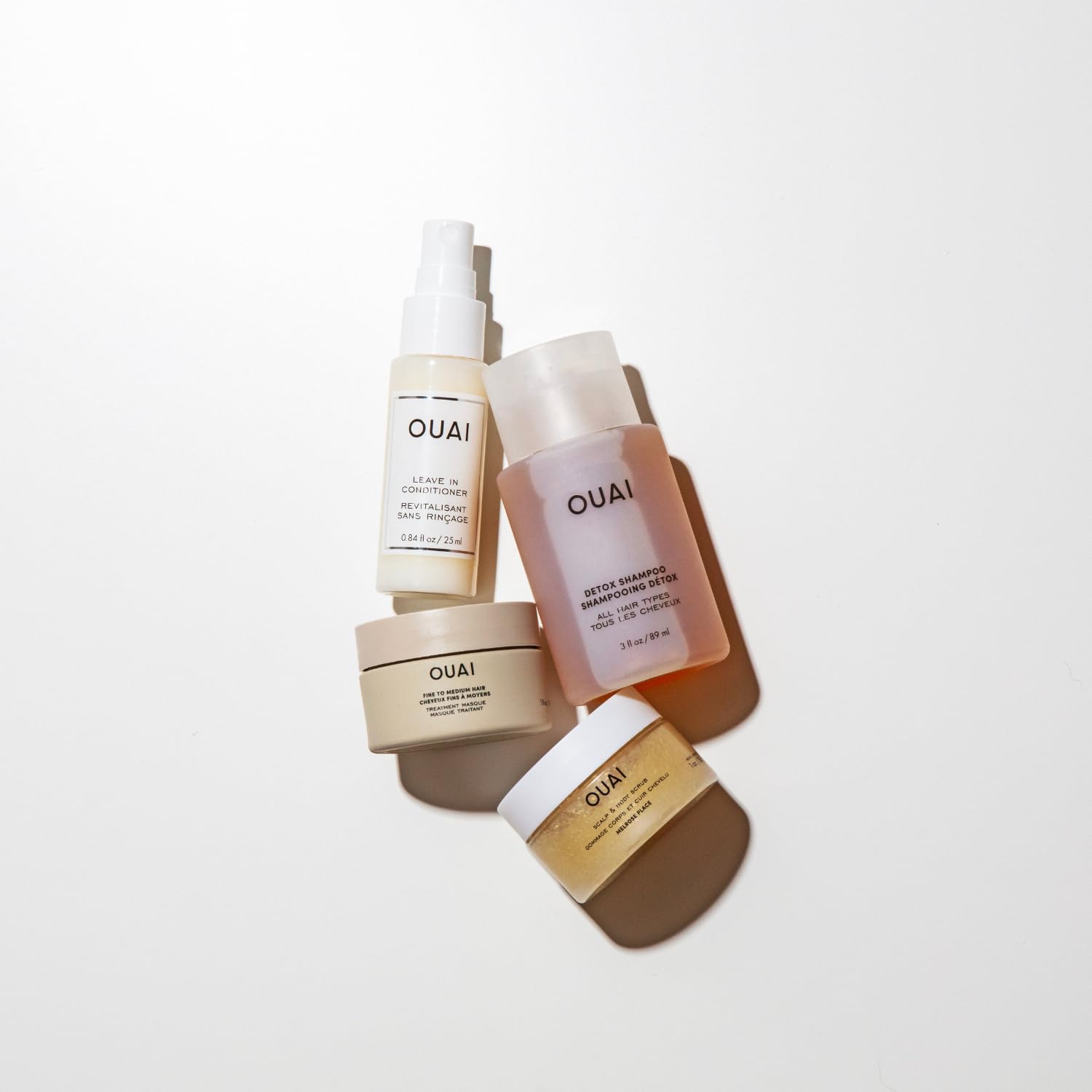 OUAI Travel Kit - Includes Travel Size Leave In Conditioner, Detox Shampoo, Fine to Medium Hair Mask, Scalp & Body Scrub (4 Count) OUAIAu supplements